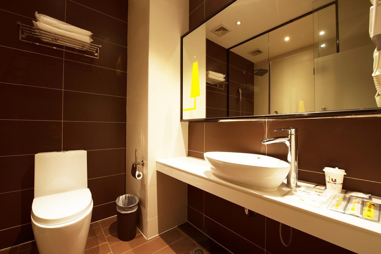 Iu Hotel Zhanjiang Haibin Avenue Xinhaimingchen Экстерьер фото