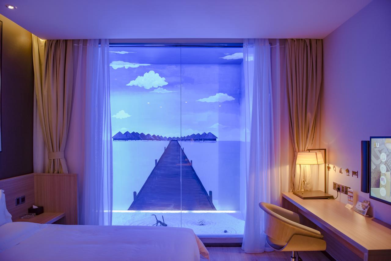 Iu Hotel Zhanjiang Haibin Avenue Xinhaimingchen Экстерьер фото