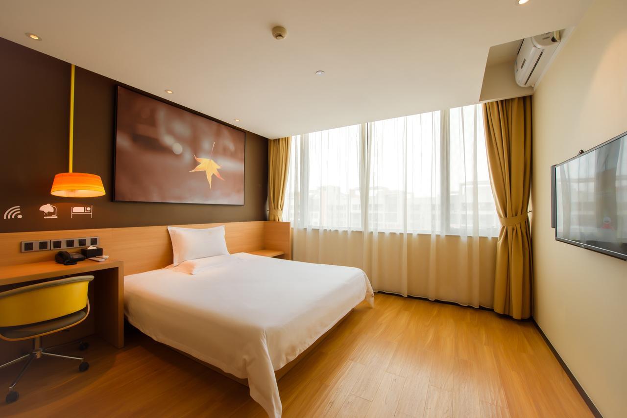 Iu Hotel Zhanjiang Haibin Avenue Xinhaimingchen Экстерьер фото